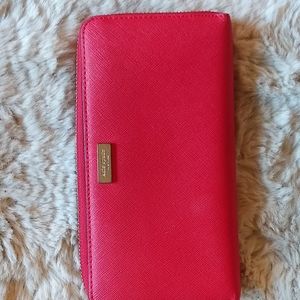 Kate Spade large red wallet. Tote sold separately.